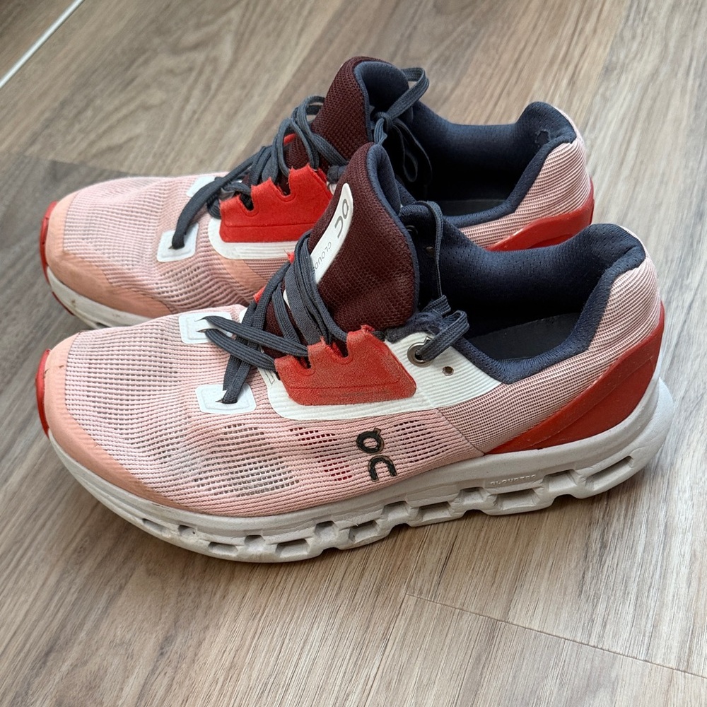 On Running Coral and Burgundy Sneakers